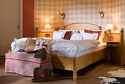 Hotel room furniture in country house style